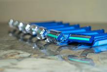 A Bundle Of Sharp And New Shaving Razors In Blue Color  