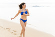 © AntonioDiaz - Sexy Woman In Bikini Running On Beach