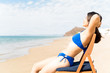© AntonioDiaz - Woman Enjoying Suntan At Beach