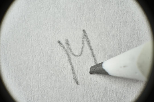 Hand writed with pencil Letter M. Macro