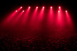 © Danil Nikonov - Red stage light with smoke in rock music concert. silhouettes of concert crowd in front of bright stage lights. concert lighting equipment against a dark background ilustration