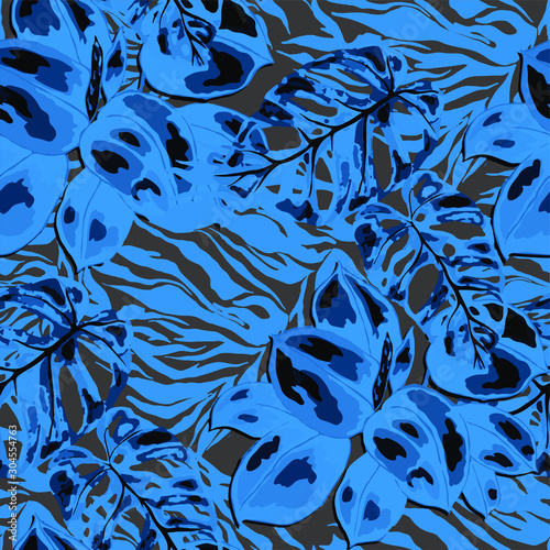 Seamless pattern with tropical leaves on zebra stripes. Beautiful allover pri...