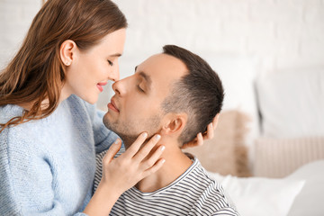 Sticker - Portrait of happy young couple at home