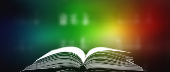 Poster - Stack of books in the library and blur bookshelf background