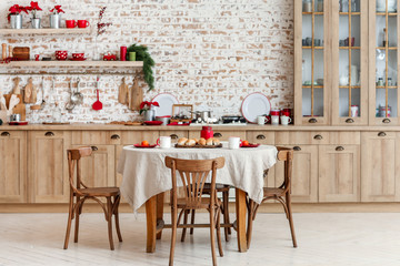 Interior of stylish kitchen with served table