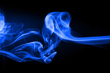 Blue Smoke Movement Abstract On Black Background, Darkness Concept
