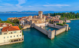Fototapeta Tęcza - Aerial view to the town of Sirmione, popular travel destination on Lake Garda in Italy