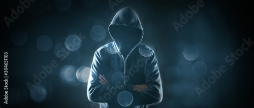 Fotomural Cybersecurity, computer hacker with hoodie