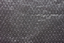 Bubble Wrap Packing On Dark Black Background