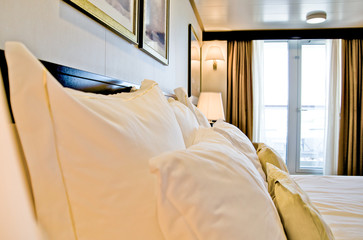 Luxury balcony outside exterior cabin stateroom suite accommodation on luxury cruise ship ocean liner Cunard Queen Elizabeth Queen Victoria in classic design and elegant interior architecture