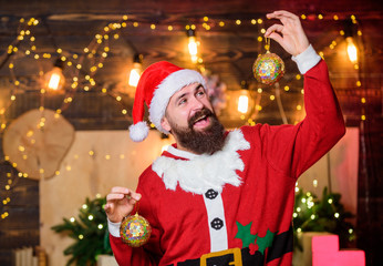 Poster - Bearded man Santa Claus decorating christmas tree with golden decorations. Winter decorations. Shimmering balls christmas decorations. Sale and discount. Most wonderful time of year. Decorations shop