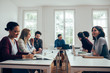© LStockStudio - Business People Having a Meeting
