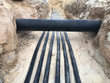 © Philipp Berezhnoy - The high voltage electrical cable is laid in a trench