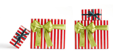 Wall Mural - Christmas gift boxes decorated with ribbon bow on white background