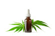 Glass Bottle of CBD or THC Oil with Hemp or Medical Cannabis Plant Leaves Isolated on White Background with Copy Space