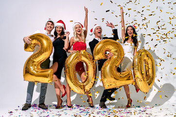 Wall Mural - Group of people celebrating Christmas isolated