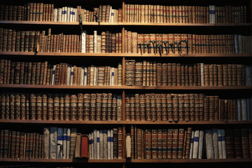 Wall Mural - old books on wooden shelf