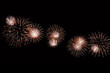 © FedotovAnatoly - Flashes of gold fireworks against black sky