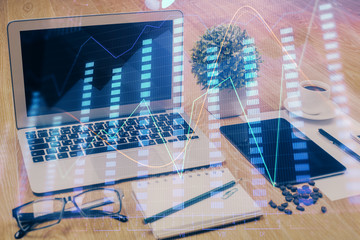  Double exposure of forex chart and work space with computer. Concept of international online trading.