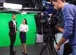 © New Africa - Presenters and video camera operator working in studio. News broadcasting