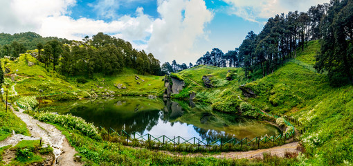 Wall Mural - a panoramic view of the serolsar lake, jalori pass, himachal pradesh, india