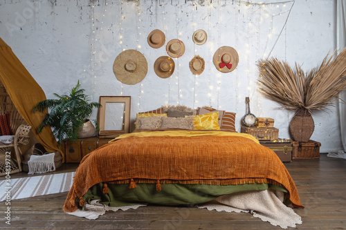 Fototapeta Cozy house with room in boho style interior