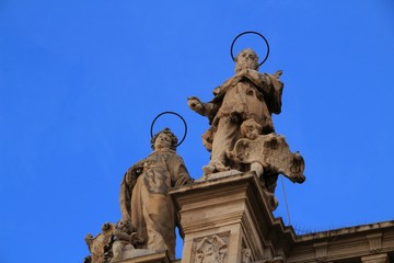 Wall Mural - Tower bell, sculptures and carved stone details of the Cathedral of Murcia