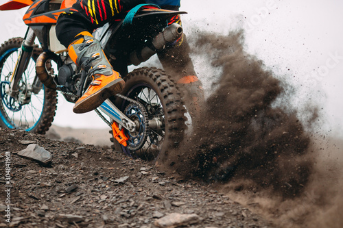 Fotomural Details of debris in a motocross race .
