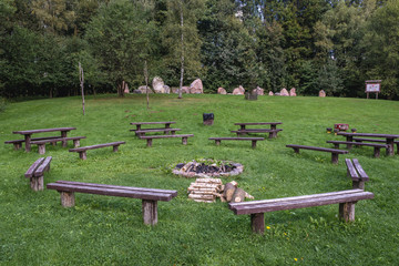 Poster - Rest area with lapidarium in Landscape Park of Dylewo Hills near Ostroda town in Poland