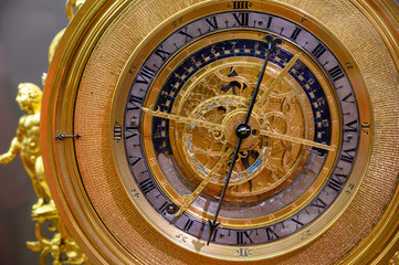 an ancient clock with constellations