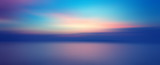 Fototapeta Desenie - Motion blurred background of sunset on the sea
