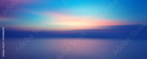 Cuadros en Lienzo Motion blurred background of sunset on the sea