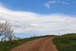 © lindamariano - road in the field wirh blue sky and clouds