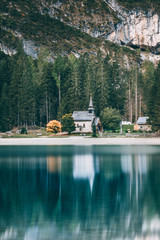 Wall Mural - Capella Lago di Braies at Lake Braies, Province of Bolzano, Trentino Alto Adige, Italy