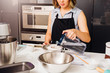 © sorapop - Woman girl in kitchen cooking thai tea