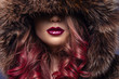 © alexydance - Beautiful girl with red lips in fur coat.