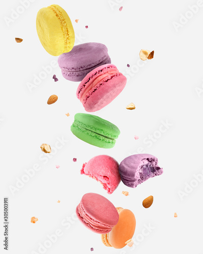 Falling tasty macarons on white background Poster Mural XXL