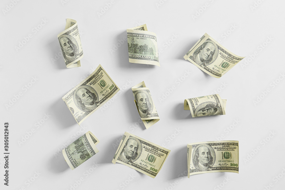 Dollar banknotes on white background
