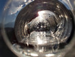 canvas print picture - Drinking pure water from a bottle at sunrise. Point of view close up.
