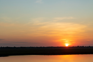 Wall Mural - sunset over lake