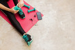 © AdriaVidal - Stock photo of a young woman resting after exercising at home in the living room with a bottle