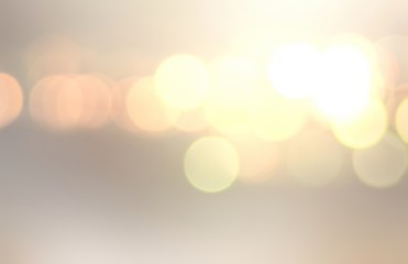 bokeh golden pattern on cool background. holiday glare abstract illustration. lights on beige backdr