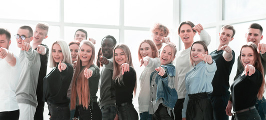 Wall Mural - group of young like-minded people pointing at you