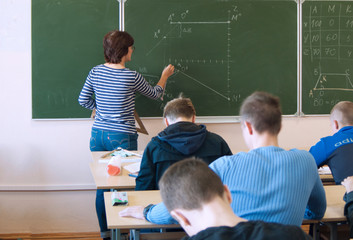 students sit in the classroom during the lessons