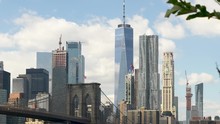 Closeup Of Lower Manhattan Landmarks: Iconic Skyscrapers And Brooklyn Bridge