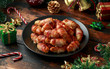 Christmas Pigs in blankets, sausages wrapped in bacon with decoration, gifts, green tree branch on wooden rustic table