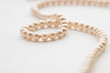 Pearls on white background with copy space