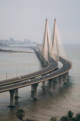 Wall Mural - high angle shot of bandra worli sealink in mumbai enveloped with fog