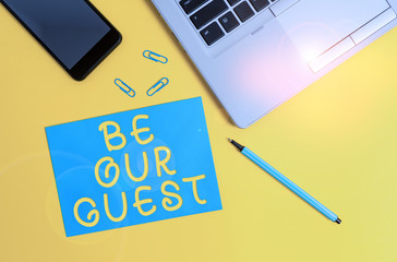 Poster - Conceptual hand writing showing Be Our Guest. Concept meaning You are welcome to stay with us Invitation Hospitality Trendy open laptop smartphone marker paper sheet clips