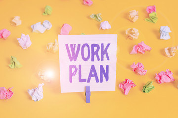 Fototapete - Word writing text Work Plan. Business photo showcasing project to be accomplished and outlines how it will be done Colored crumpled papers empty reminder white floor background clothespin